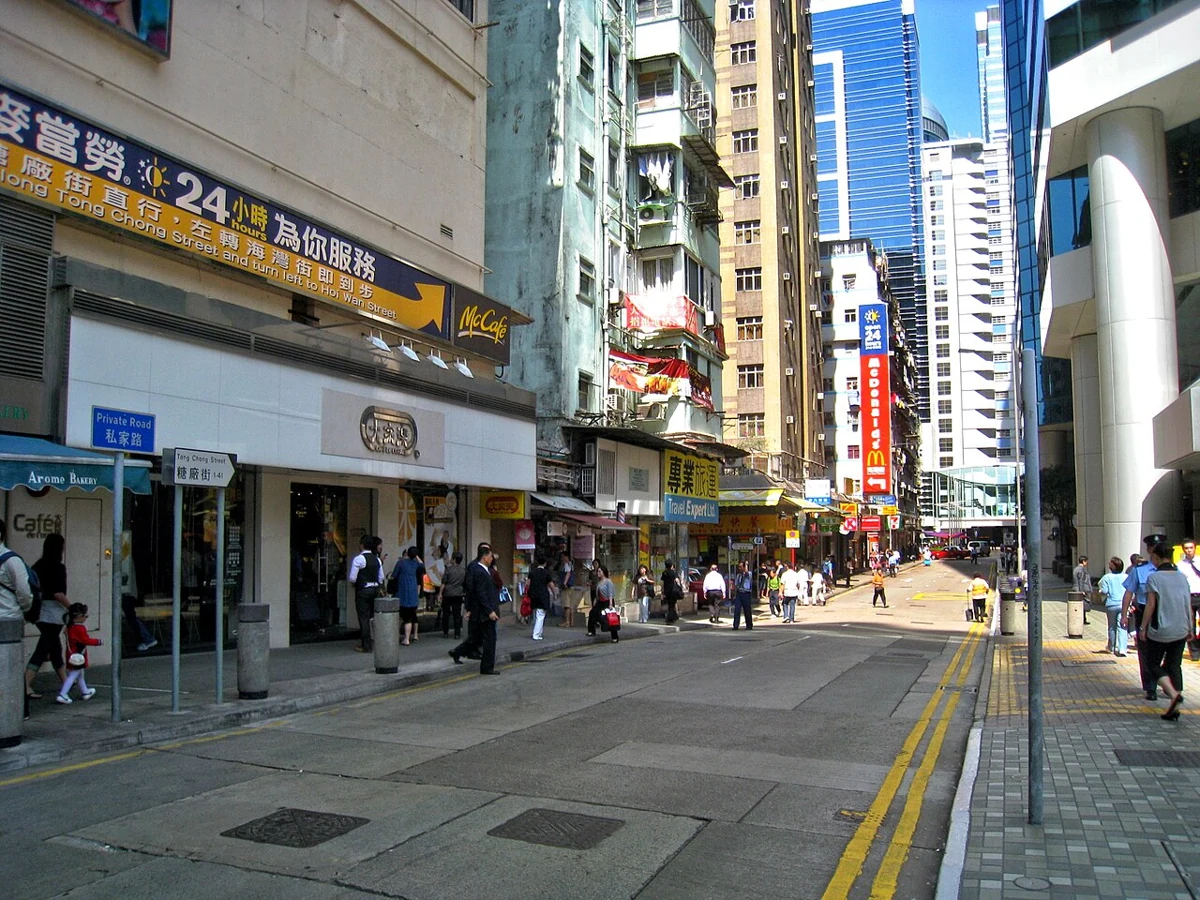 Hong Kong Christmas Markets 2026: 4 Places and Date-Checking Tips Historic Tong Chong Street streetscape beside Taikoo Place